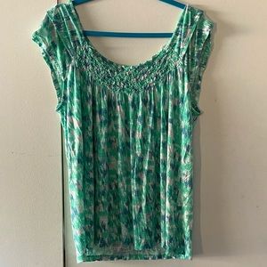 Woman’s XL Cap Sleeve Shirt.